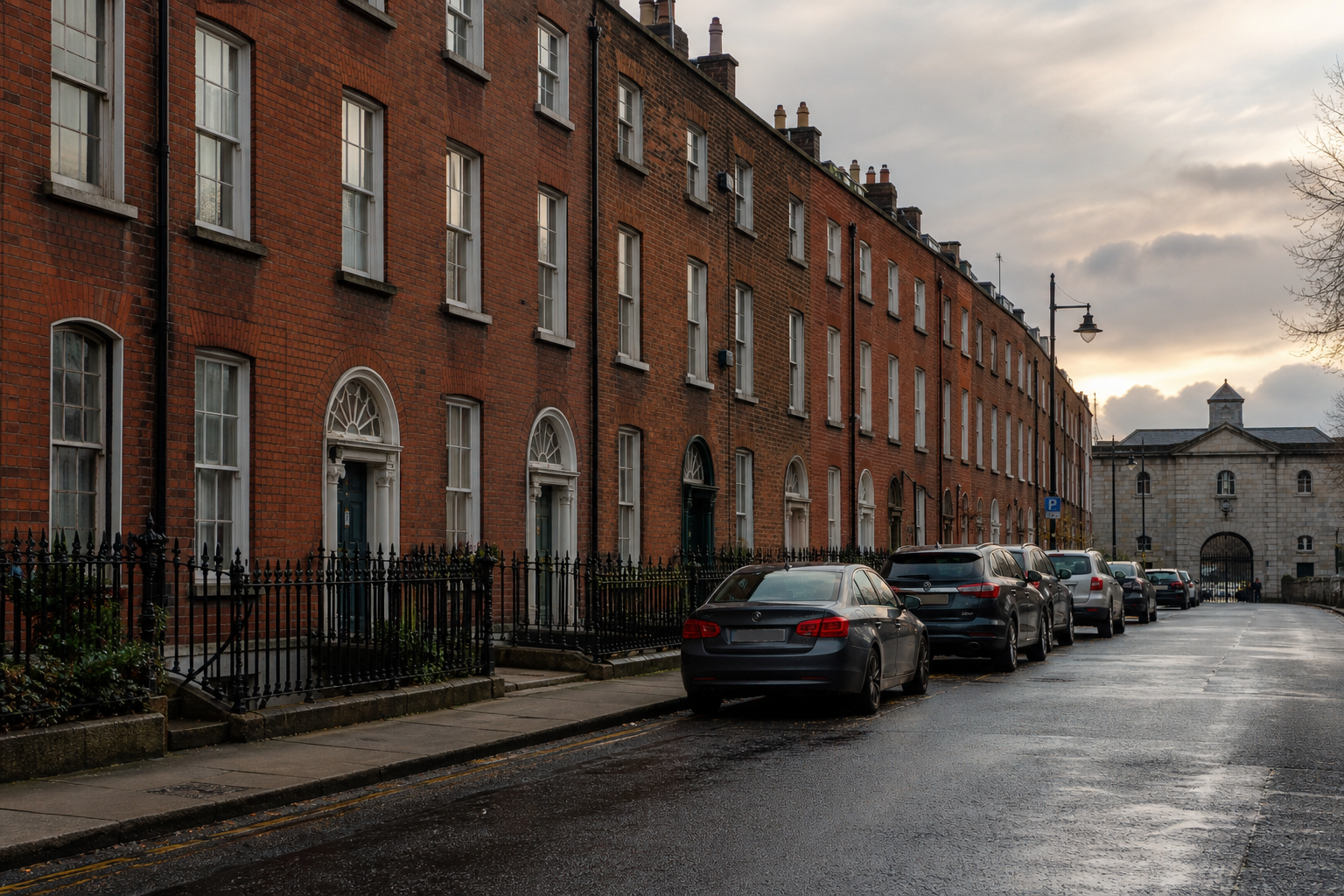 Victorian red-brick terraced houses along Bow Lane West in Kilmainham, Dublin 8, on a soft overcast afternoon